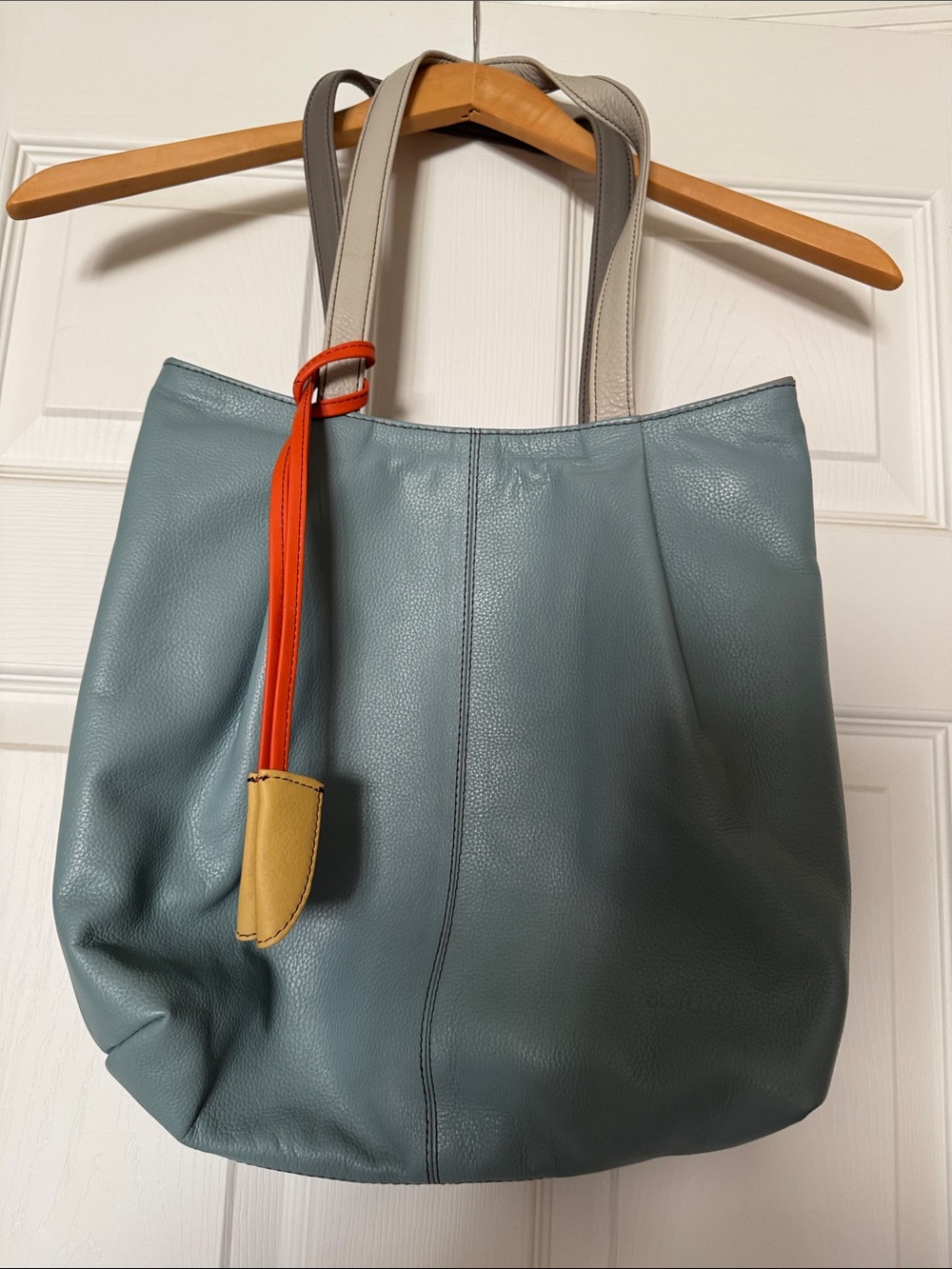 Blue-Gray Leather Shoulder Tote with Beige Straps and Orange Accent